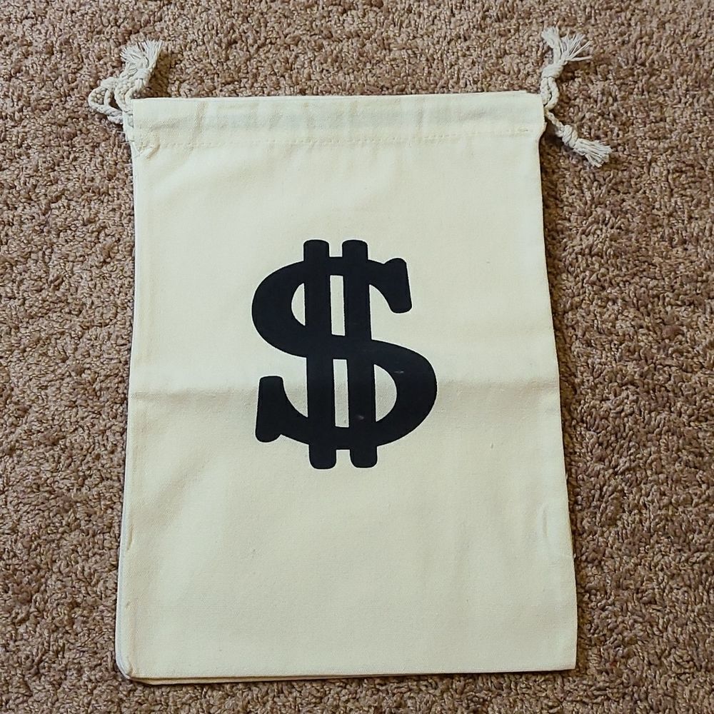 Canvas money sign bag measures at 15" x 10.5". NWOT